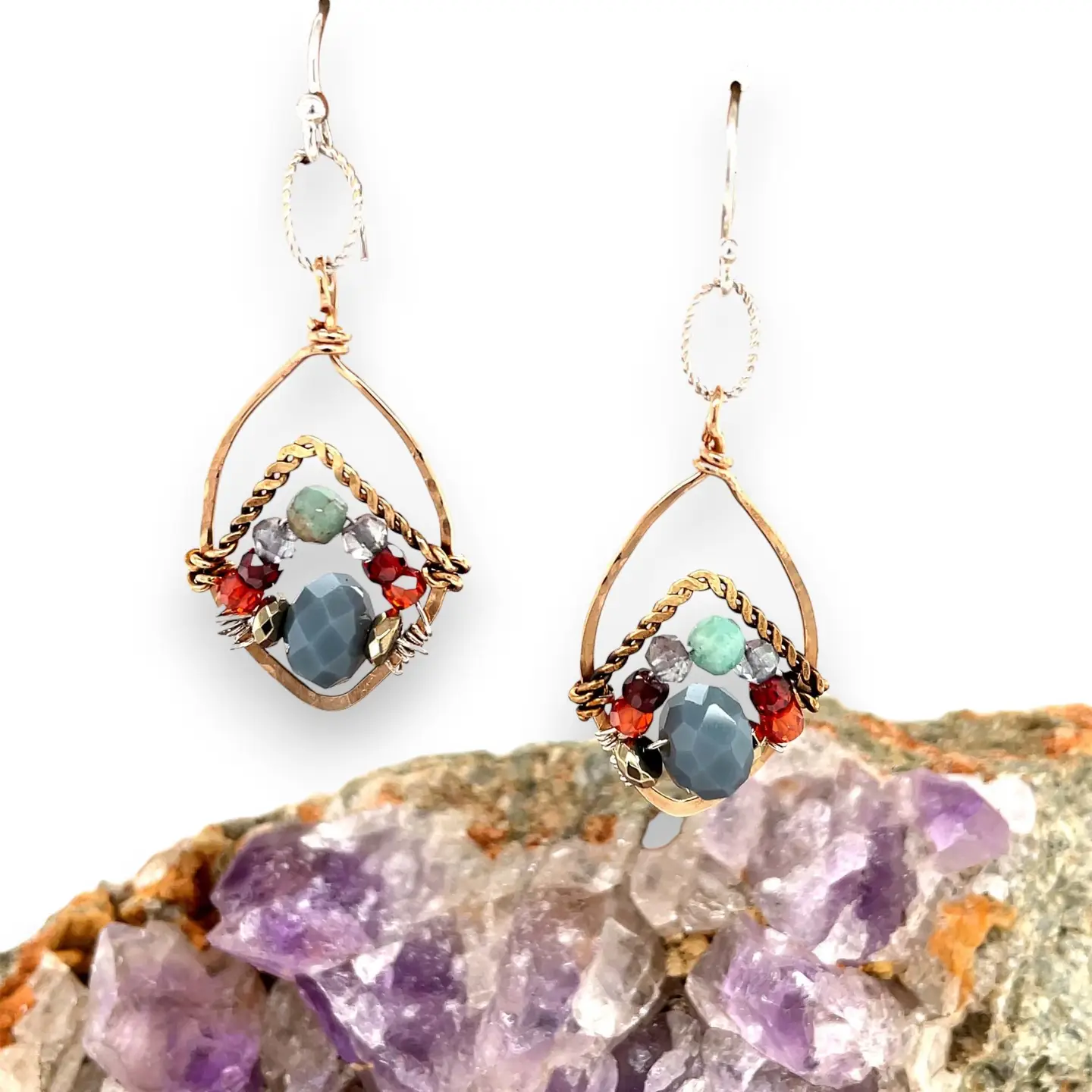 Amazonite, blue labradorite, crystal, pyrite, and cubic zirconia gemstones held within a mini bronze marquise earring with hammered brass twist wire accent