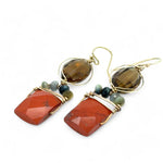 Brick red jasper rectangle wrapped in gold filled wire and cat's eye gemstones hanging from a smokey quartz wrapped in gold filled wire earrings
