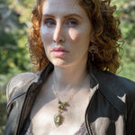 Handmade sterling silver necklace with flashy green labradorite accented with olive green fresh water pearl, rough pyrite, and cubic zirconia gemstones. Gold-filled wire and diamond cut links, with sterling silver box chain