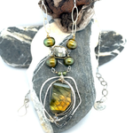 Handmade sterling silver necklace with flashy green labradorite accented with olive green fresh water pearl, rough pyrite, and cubic zirconia gemstones. Gold-filled wire and diamond cut links, with sterling silver box chain