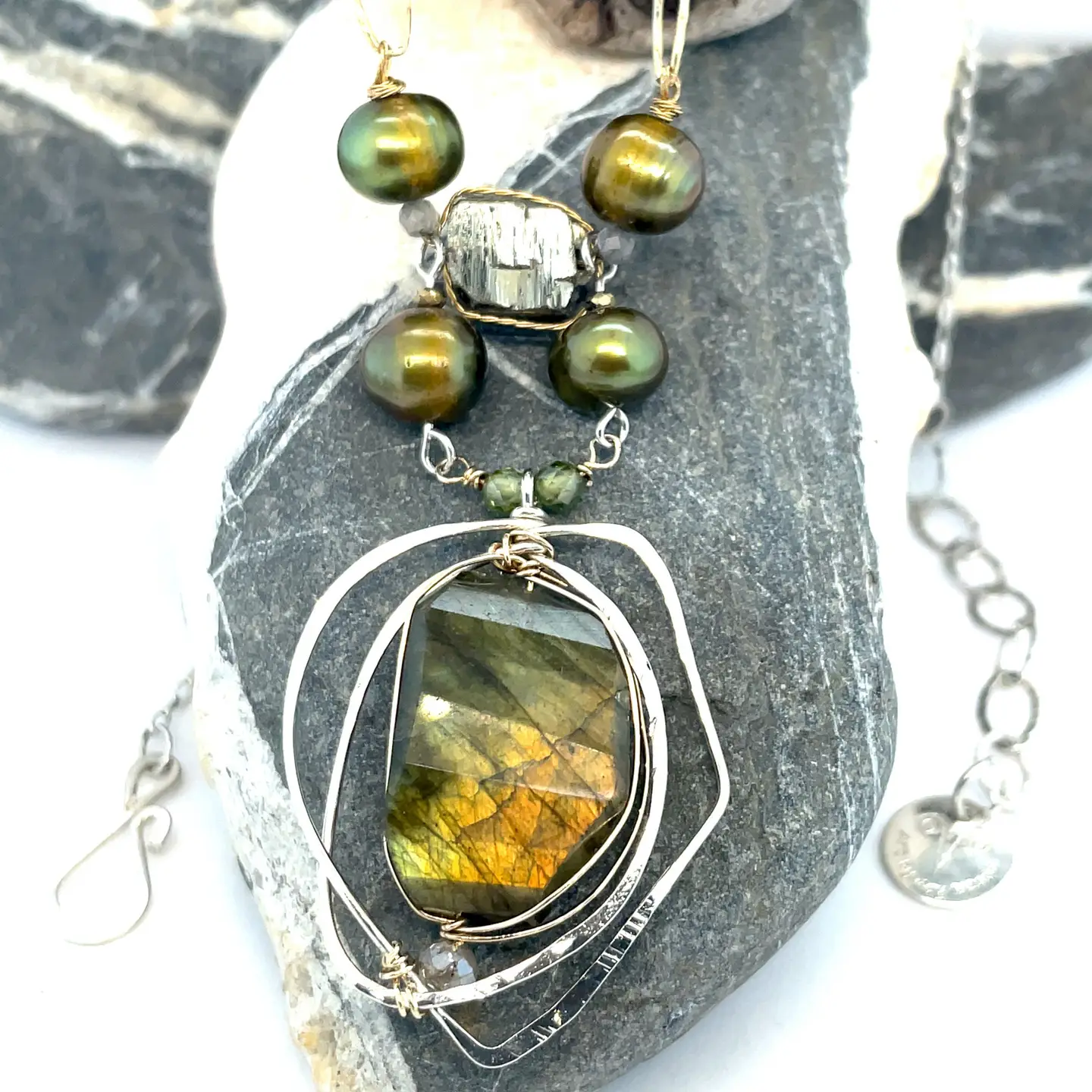 Handmade sterling silver necklace with flashy green labradorite accented with olive green fresh water pearl, rough pyrite, and cubic zirconia gemstones. Gold-filled wire and diamond cut links, with sterling silver box chain