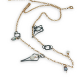 Gold filled and oxidized sterling silver star charm necklace with rainbow moonstone, and silver blue fresh water pearl accents