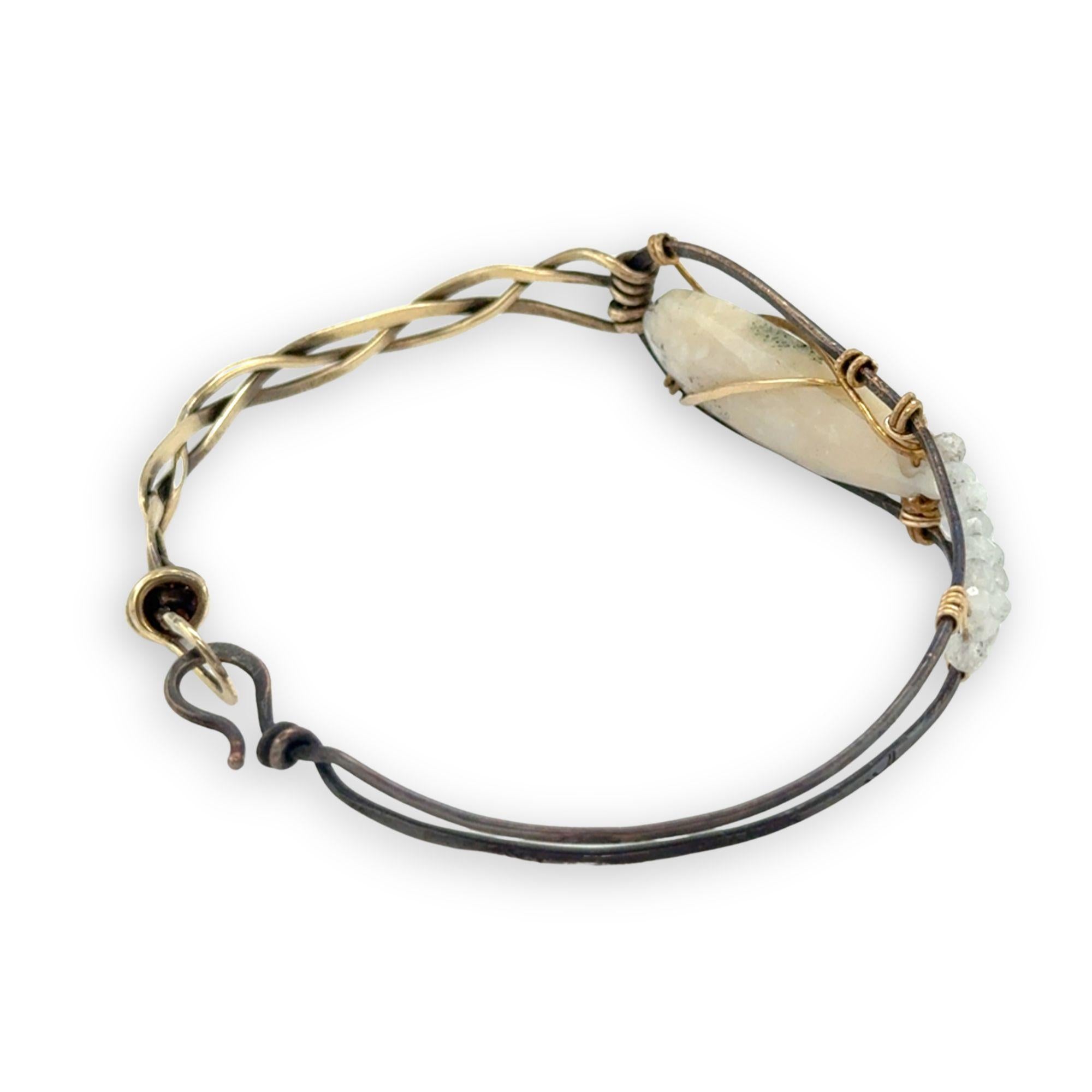 Half oxidized sterling, half braided brass bracelet with a large opal teardrop accented with moonstone gemstones