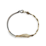 Half oxidized sterling, half braided brass bracelet with a large opal teardrop accented with moonstone gemstones