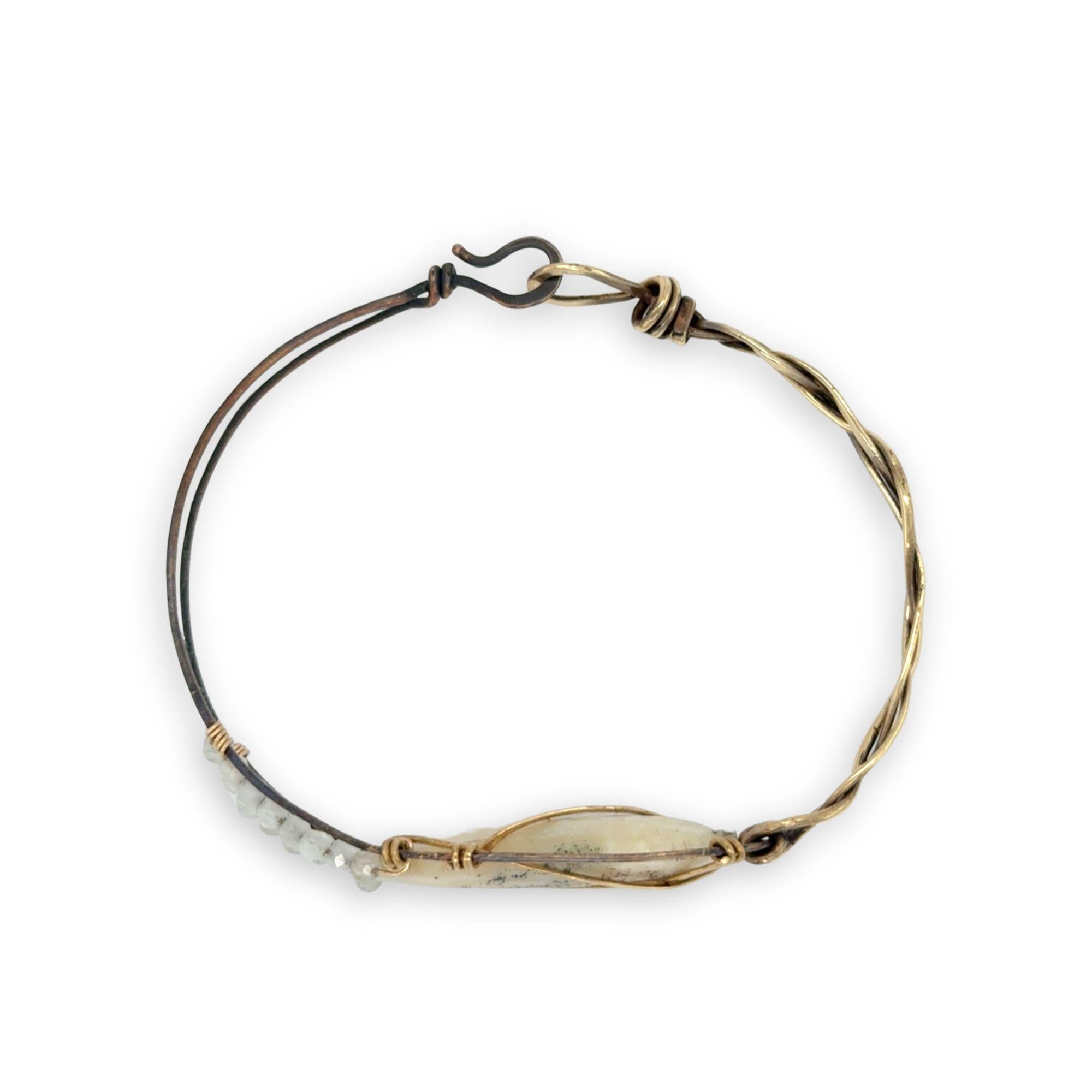 Half oxidized sterling, half braided brass bracelet with a large opal teardrop accented with moonstone gemstones