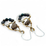 Pair of earrings with brass and silver teardrop designs with chrysocolla, fresh water pearl, and a mini smooth teardrop smokey quartz