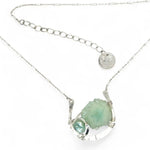 Mint druzy quartz slab and mint keshi fresh water pearl inside a sterling silver hammered u shaped pendant necklace