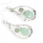 floral stamped and hammered sterling silver paisley shaped earrings with mint colored jade faceted drops and green kyanite gemstones