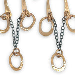 Bronze arch tops and hammered oval charm earrings featuring delicate darkened sterling silver chain