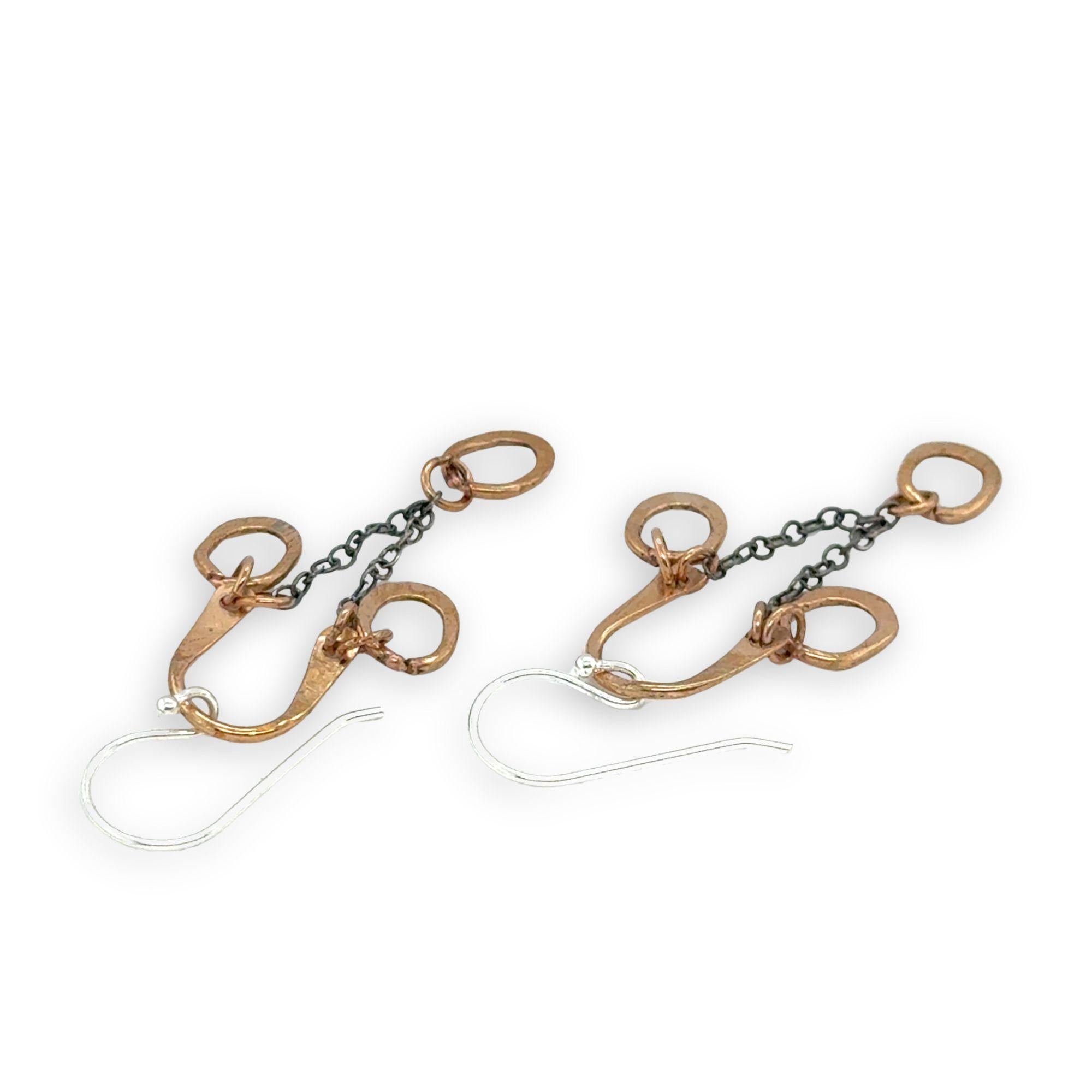 Bronze arch tops and hammered oval charm earrings featuring delicate darkened sterling silver chain