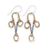Bronze arch tops and hammered oval charm earrings featuring delicate darkened sterling silver chain