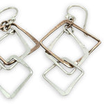 interlocking bronze and sterling silver handmade hammered diamonds to form a mobile shaped earrings