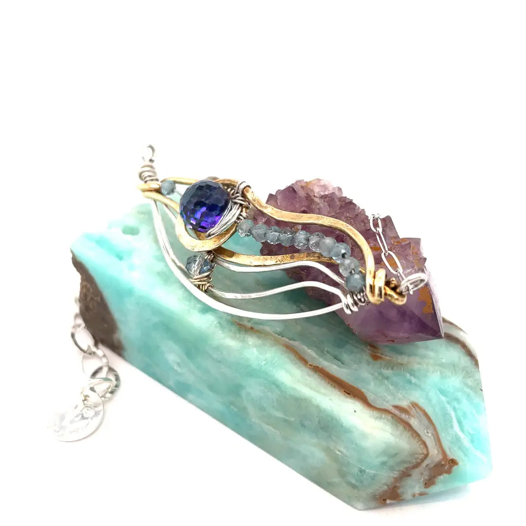 Handmade hammered sterling silver and brass mollusk pendant necklace with crystal disco ball, labradorite, and crystal gemstones on sterling silver and gold-filled chain