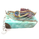 Handmade hammered sterling silver and brass mollusk pendant necklace with crystal disco ball, labradorite, and crystal gemstones on sterling silver and gold-filled chain