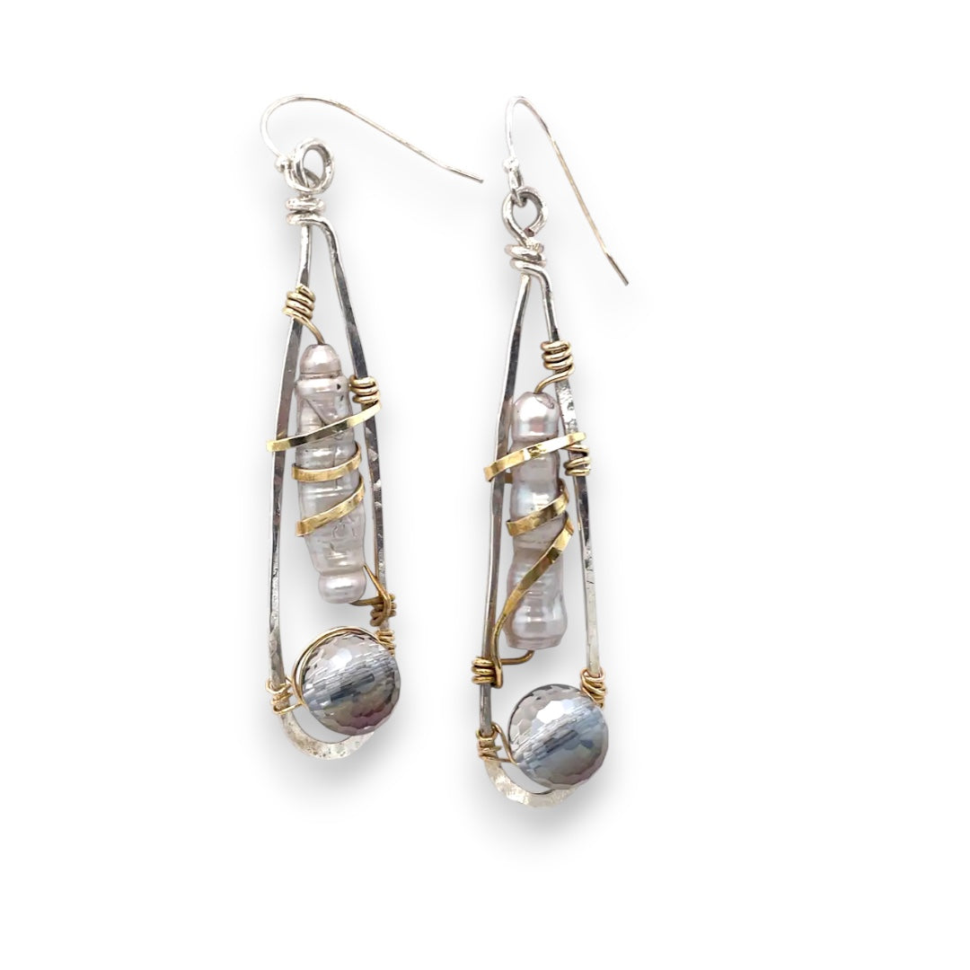 Sterling silver skinny drop earrings with fresh water stick pearls wrapped in brass wire and a crystal disco ball nested in gold filled wire