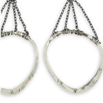 Star and dandelion stamped and hammered sterling silver organic hoops hanging from layers of darkened sterling silver delicate chain earrings