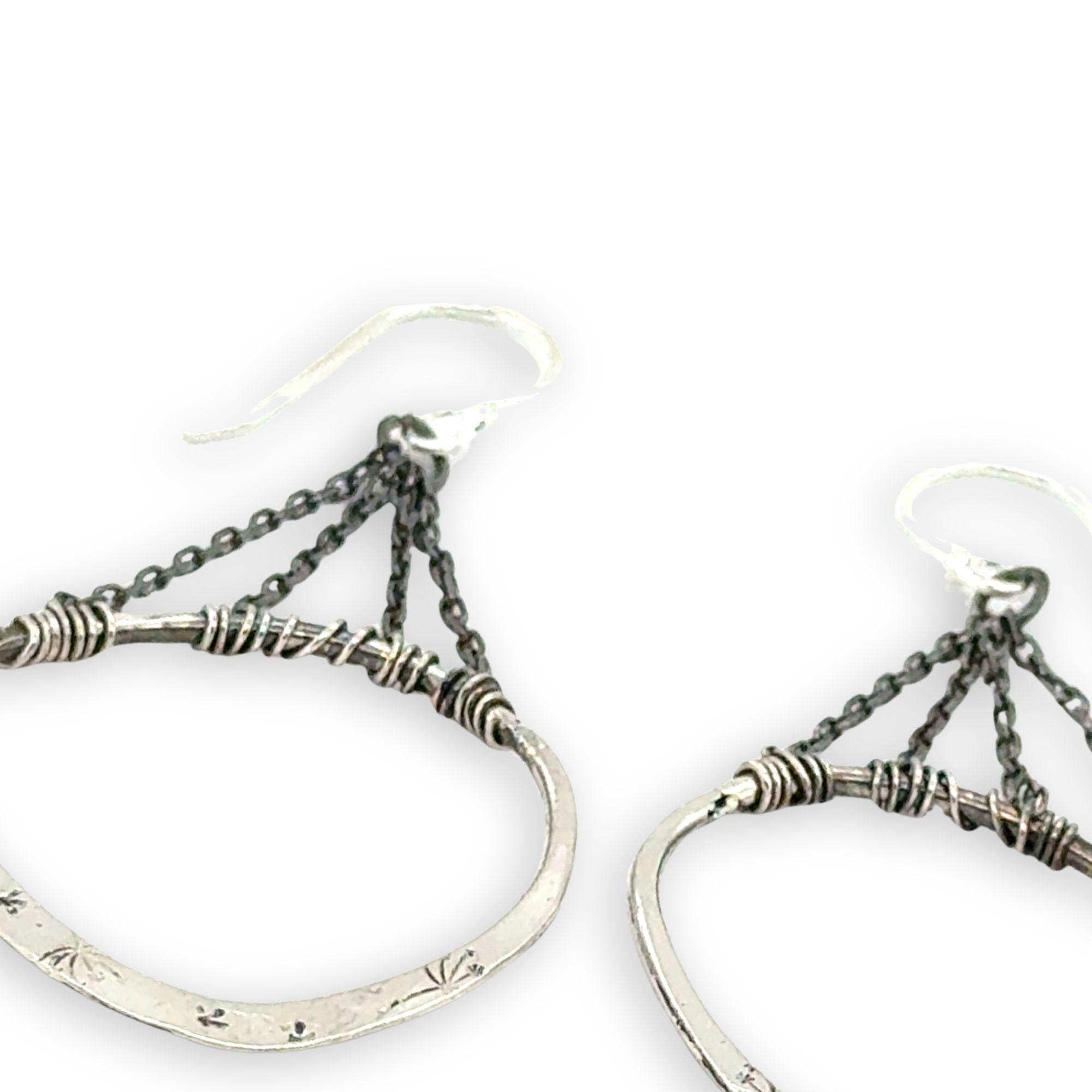 Star and dandelion stamped and hammered sterling silver organic hoops hanging from layers of darkened sterling silver delicate chain earrings