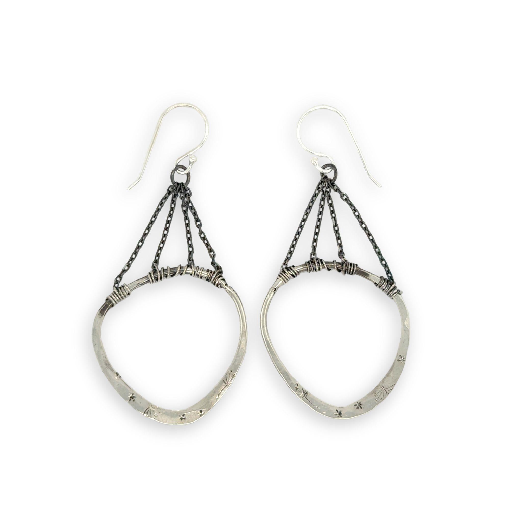 Star and dandelion stamped and hammered sterling silver organic hoops hanging from layers of darkened sterling silver delicate chain earrings