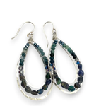 A pair of sterling silver channel drop earrings with blue opal nuggets and blue tourmaline micro faceted gemstones, featuring tiny crystal accents.