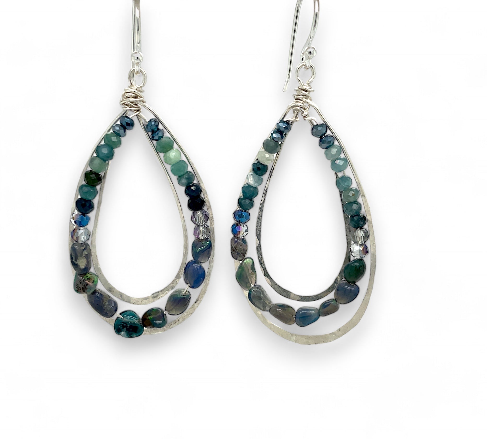 A pair of sterling silver channel drop earrings with blue opal nuggets and blue tourmaline micro faceted gemstones, featuring tiny crystal accents.