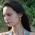 pair of handmade bronze drop earrings with quartz coins, crystal, blue opal, and moss agate faceted gemstones held on gold filled wire