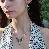 pair of handmade bronze drop earrings with quartz coins, crystal, blue opal, and moss agate faceted gemstones held on gold filled wire