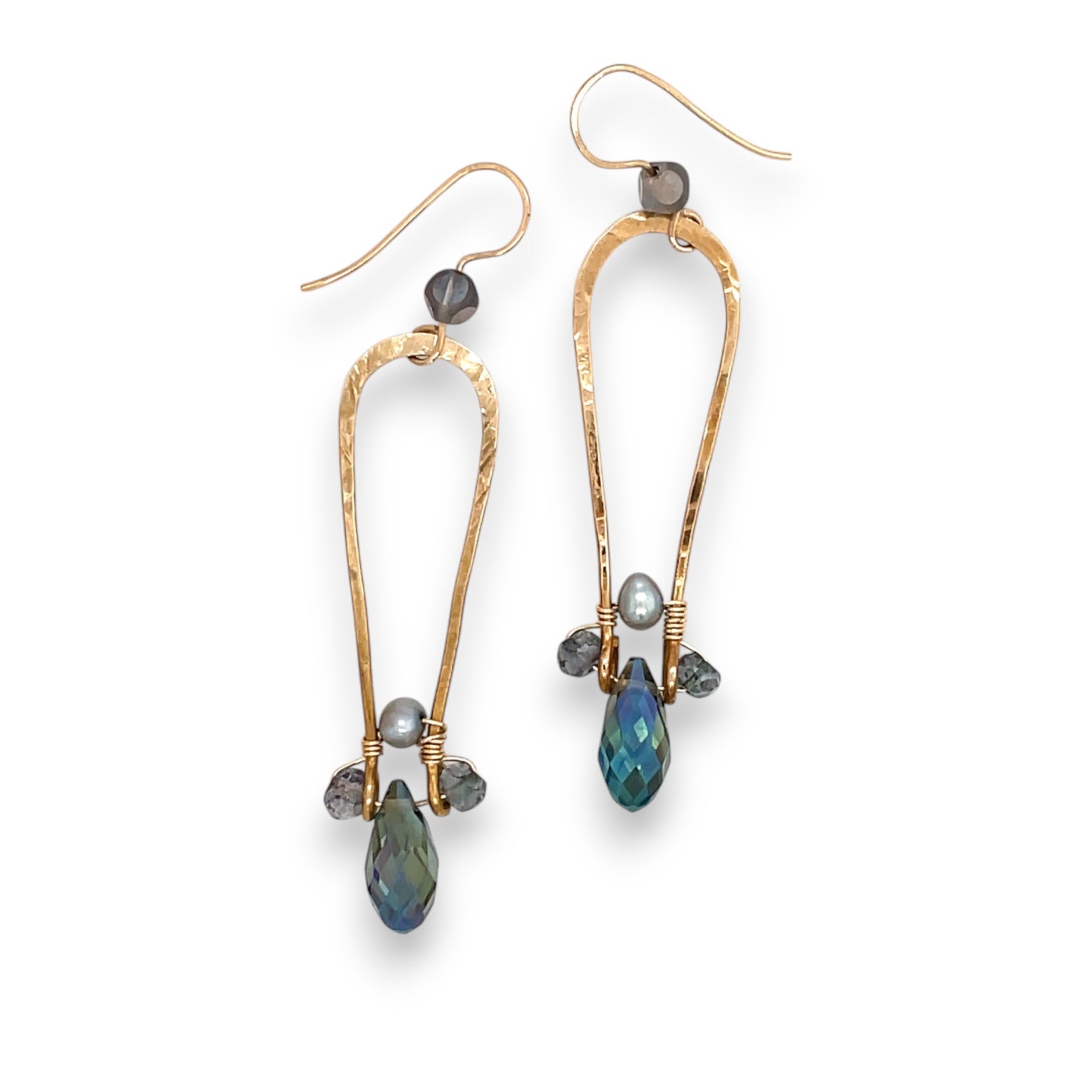 A pair brass long drop earrings featuring blue faceted tourmaline gemstones, fresh water pearls, and a blue faceted crystal with gold-filled hooks and glass bead accents.