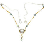 Handmade brass necklace with twisted bars intersperse with silver blue fresh water pearls and a sterling silver chain