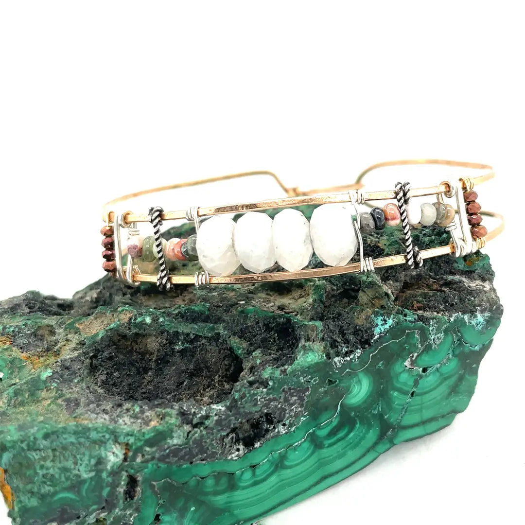 Bronze skinny bracelet with flashy moonstone, opal, and pyrite gemstones