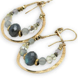 Brass stamped drop hoop earrings lined with flashy labradorite, pyrite, and rutilated quartz gemstones on gold filled wire