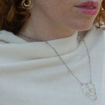 handmade hammered gold filled heart with one mini heart built in pendant on a sterling silver delicate heart chain