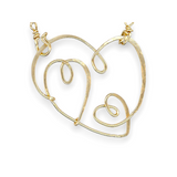 Handmade hammered gold filled heart pendant with two mini hearts built in on a sterling silver heart shaped delicate chain