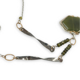 vesuvianite hexagon in gold filled and hammered sterling silver pendant on oxidized sterling silver handmade twisted bars and green cubic zirconia necklace 