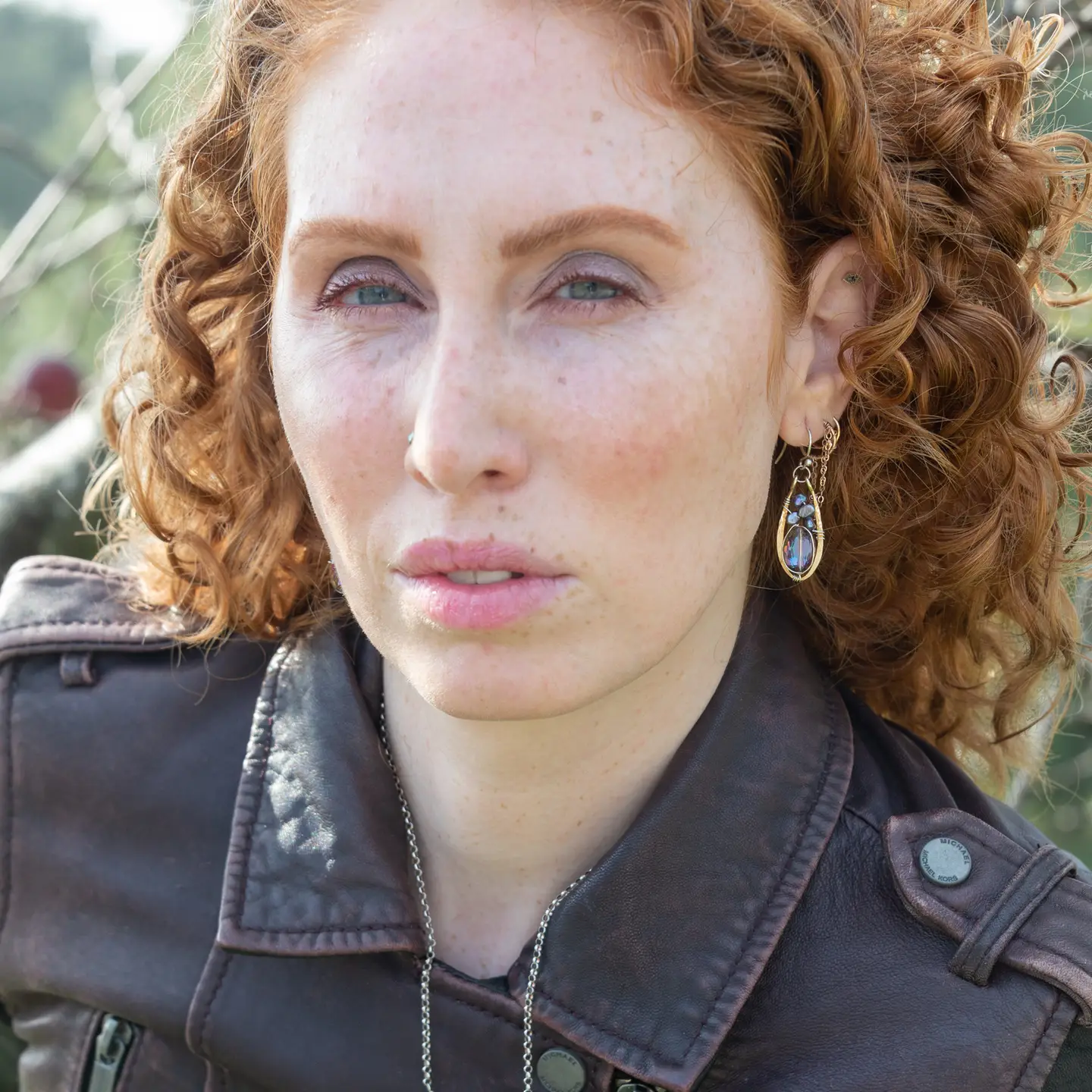 Pair of brass mini earrings with magenta crystal and fresh water pearl wrapped in sterling silver wire