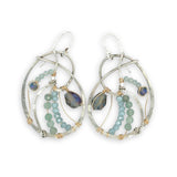 Aquamarine, amazonite, and crystal gemstones line the inside of our sterling silver nautilus shell earrings with gold filled wire