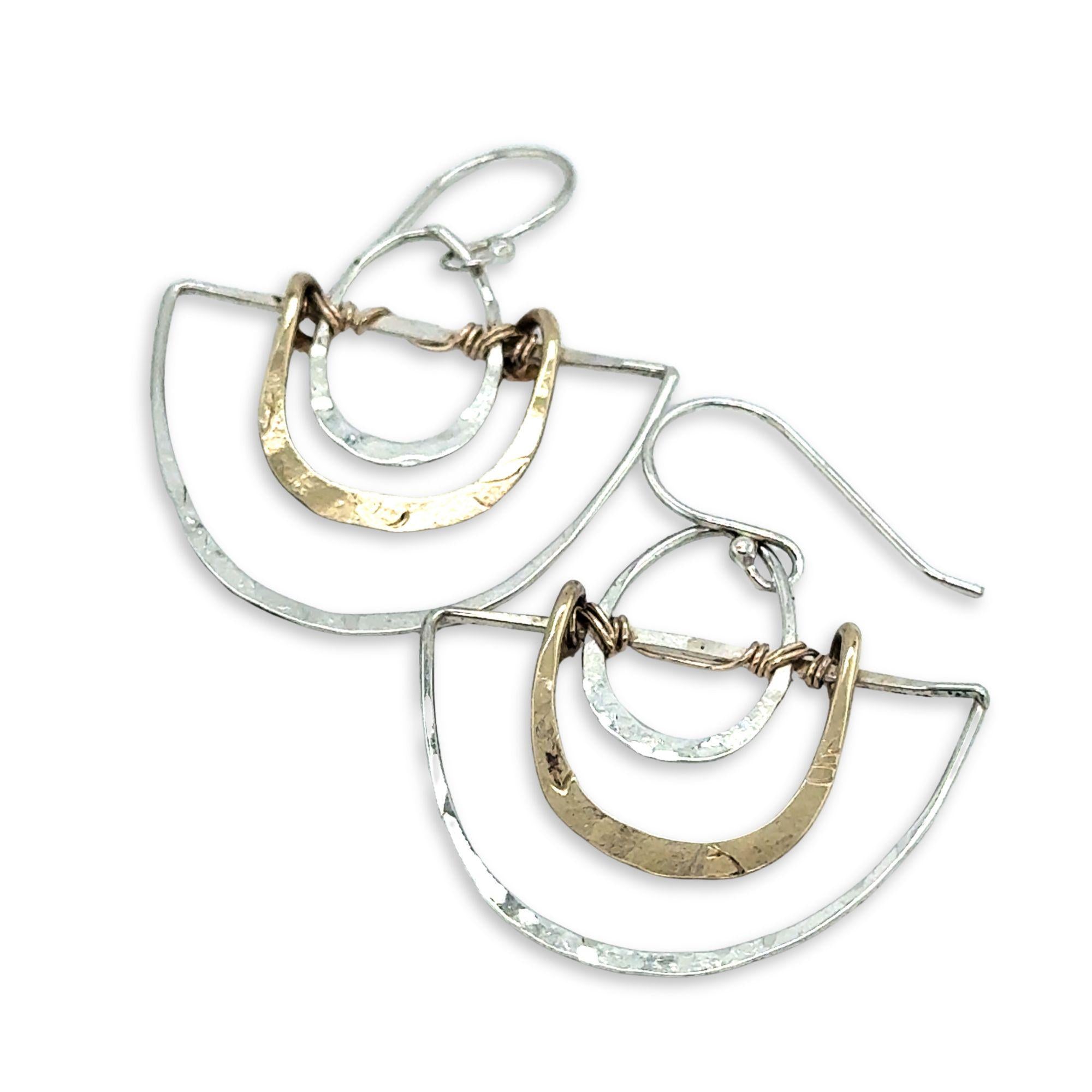 Handmade sterling silver half moons with sterling silver mini ovals and stamped brass arches attached to them with gold filled wire