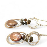 Handmade bronze mini earrings with a neutral pink fresh water pearl drop and hessonite garnet accents