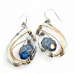 Blue crystal with labradorite accent on  stamped and darkened sterling silver drop earring with a brass hammered swish