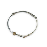 Bright and darkened sterling silver hammered point cuff bracelet with olive green fresh water pearls