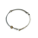 Bright and darkened sterling silver hammered point cuff bracelet with olive green fresh water pearls