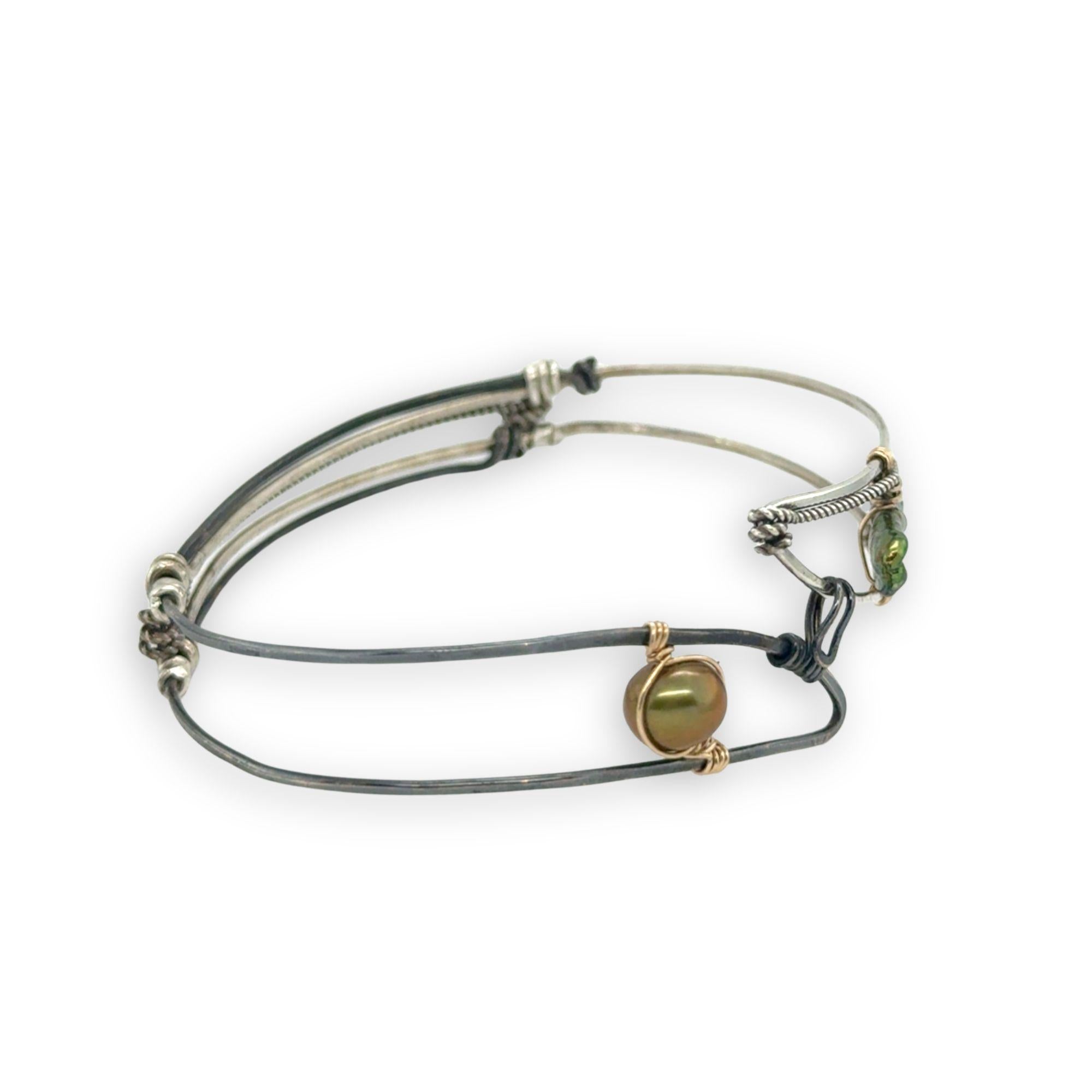 Bright and darkened sterling silver hammered point cuff bracelet with olive green fresh water pearls
