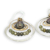 Hammered sterling silver and brass concentric hoop earrings with olive fresh water pearl and green cubic zirconia 