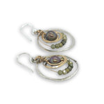 Hammered sterling silver and brass concentric hoop earrings with olive fresh water pearl and green cubic zirconia 