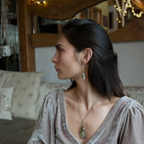 olive green fresh water pearl rectangle tiles surrounded by watermelon tourmaline gemstones and oxidized sterling silver wire on gold filled box chain earrings