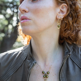 Sterling silver and brass handmade mini earrings featuring an olive green round fresh water pearl