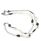 Olive green crystal and olive green/red jasper gemstones interspersed ina long chain necklace with handmade brass rectangles and gold filled links