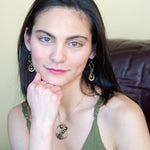 olive freshwater pearls accent a handmade hammered brass teardrop and gold filled chain earring