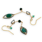 bright green cubic zirconia, green onyx, and dark green goldstone gemstones, oxidized sterling silver hammered charms adorn darkened gold fill delicate chain earrings