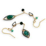 bright green cubic zirconia, green onyx, and dark green goldstone gemstones, oxidized sterling silver hammered charms adorn darkened gold fill delicate chain earrings