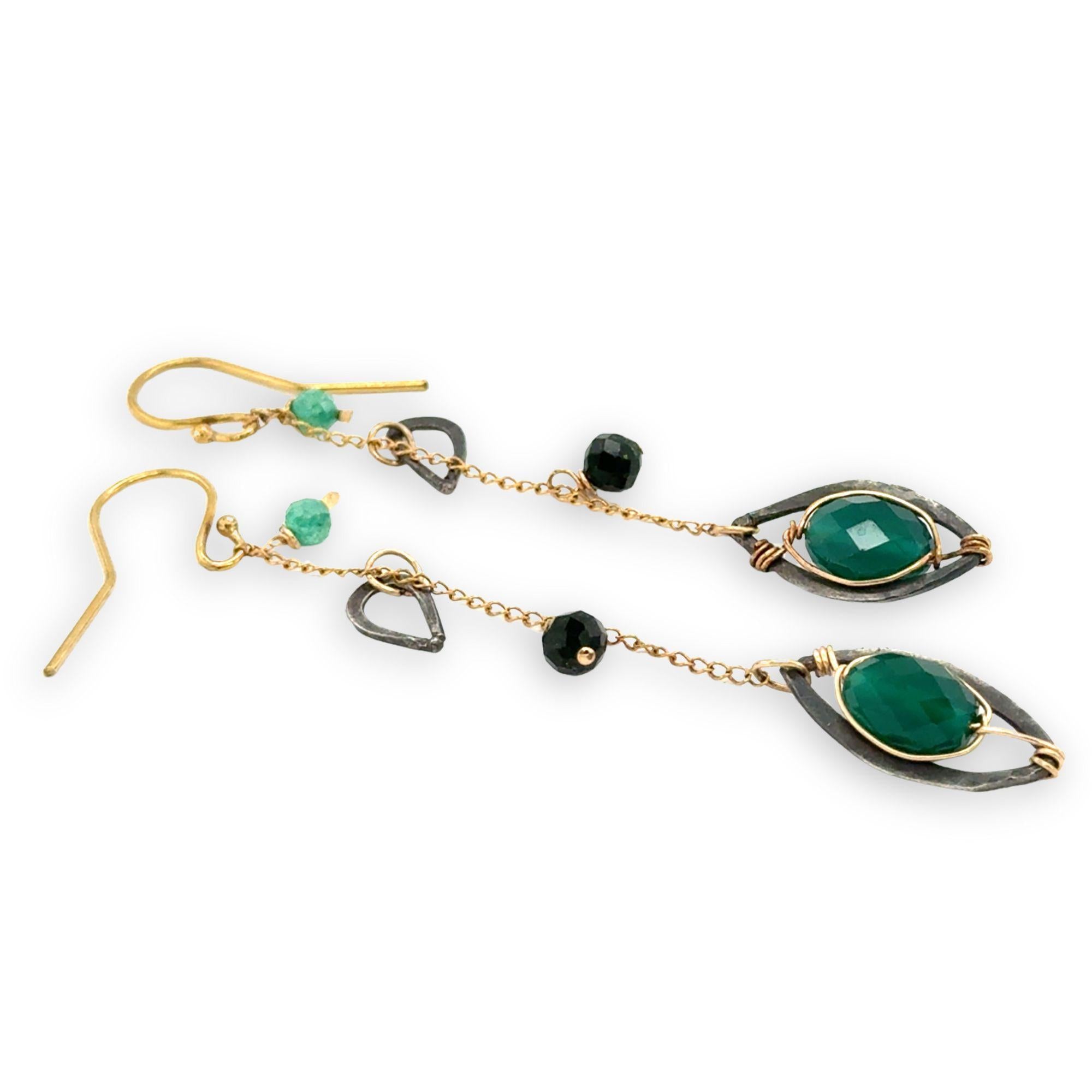 bright green cubic zirconia, green onyx, and dark green goldstone gemstones, oxidized sterling silver hammered charms adorn darkened gold fill delicate chain earrings